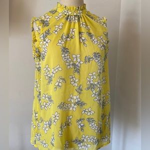 NWT!! Beautiful blouse yellow with white flower